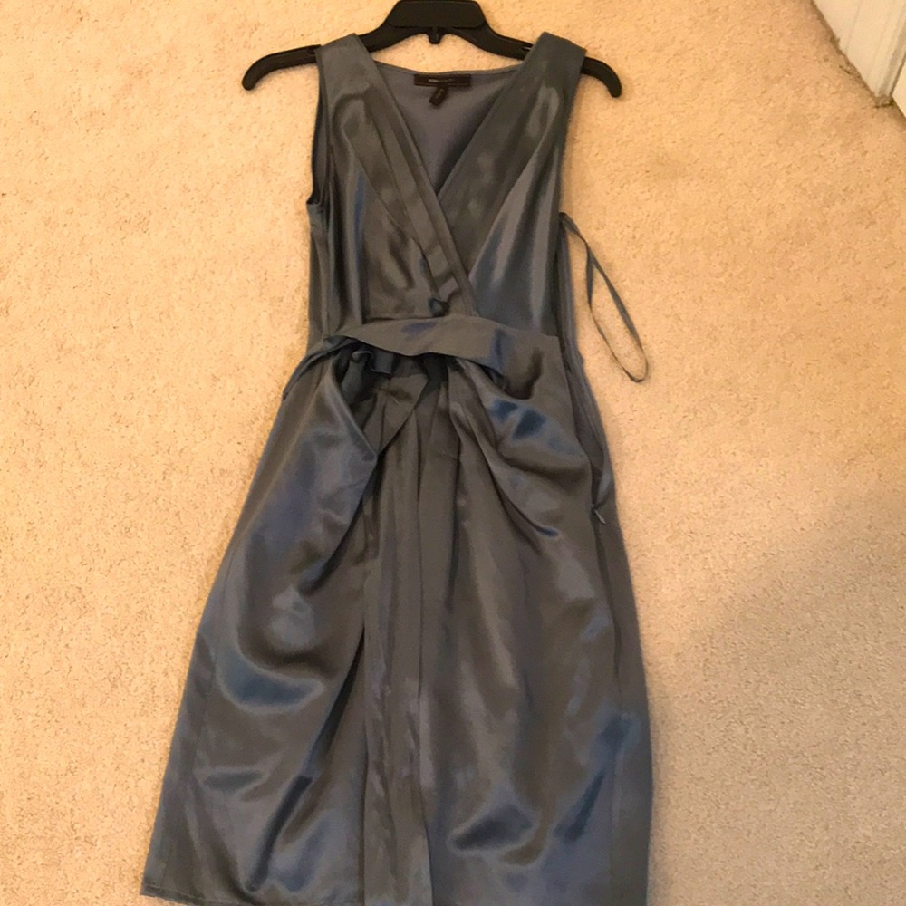 Dress has belt that ties in front or back